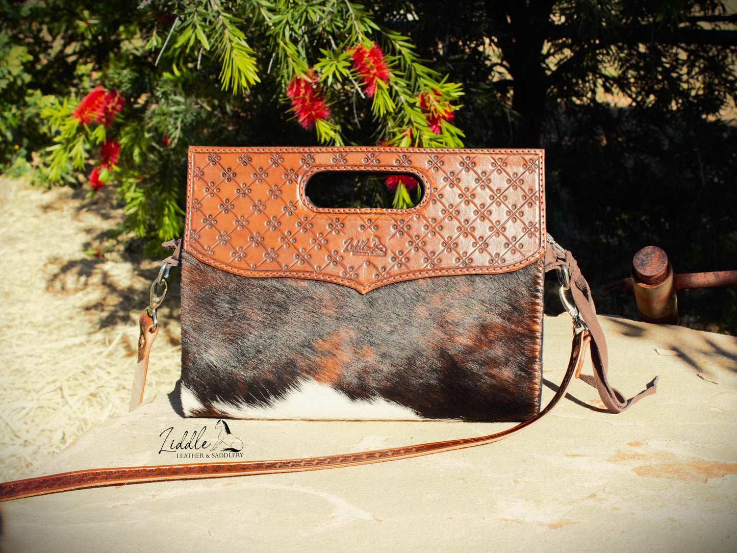 Cowhide and Tooled Clutch Bag